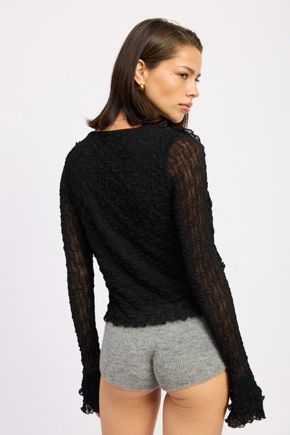 A standout blouse for those who enjoy style with comfort and delicate detailing. 