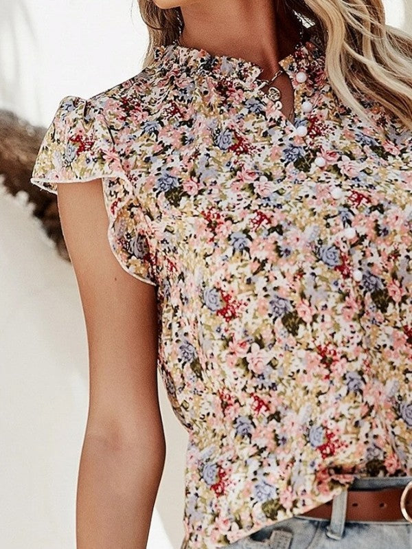 Button-neck closure lets you style it open or closed for different vibes. 