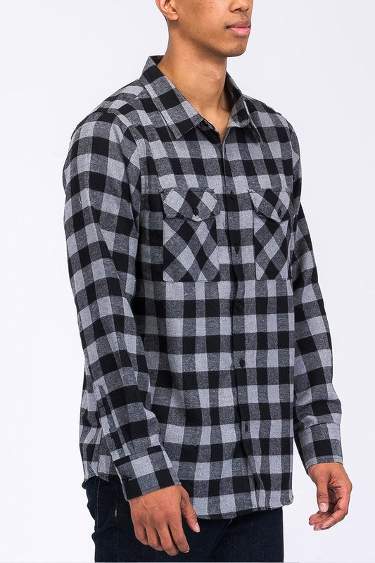The regular-fit checker plaid flannel long-sleeve is a comfortable, breathable shirt featuring a classic plaid pattern and a relaxed silhouette suitable for everyday wear.