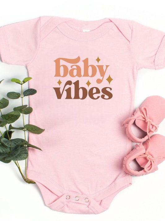 Baby onesie in vintage retro graphic print with snap leg closure and soft cotton knit fabric

