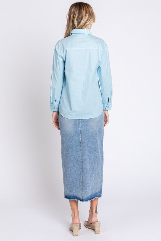 Designed for curves, this plus blouse uses rhinestones to make button-ups feel special.