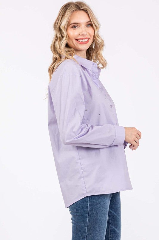 Structured collar and cuffs meet shimmering detail for a refined yet stylish finish.