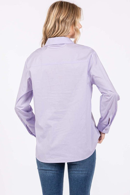 Rhinestone buttons transform this classic shirt into a chic statement piece.