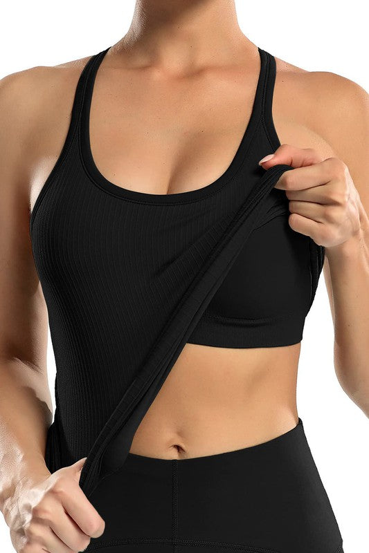 Supportive, stylish, and ready to move. This ribbed workout tank is your new go-to for everything from yoga flows to coffee runs. Designed with a flattering scoop neckline and a built-in bra for light support, it hugs in all the right places while keeping you cool and confident.