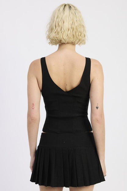 Hits around waist-length — perfect for high-waisted skirts or pants. (typical corset length) 