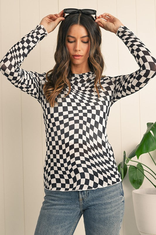 Long sleeves provide versatile coverage.