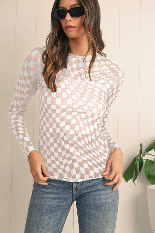 Combines classic plaid with contemporary mesh.