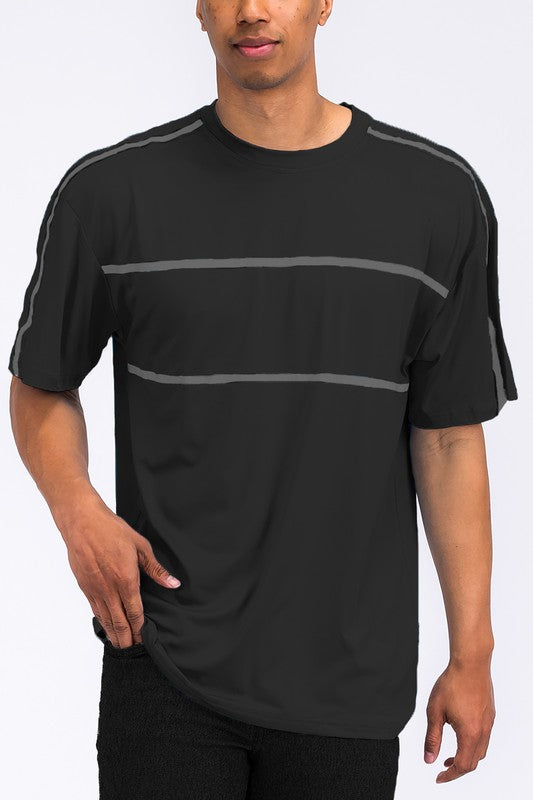 This round-neck tape stripe T-shirt combines a clean, classic silhouette with subtle tonal tape detailing along the neckline for a stylish, elevated everyday look.