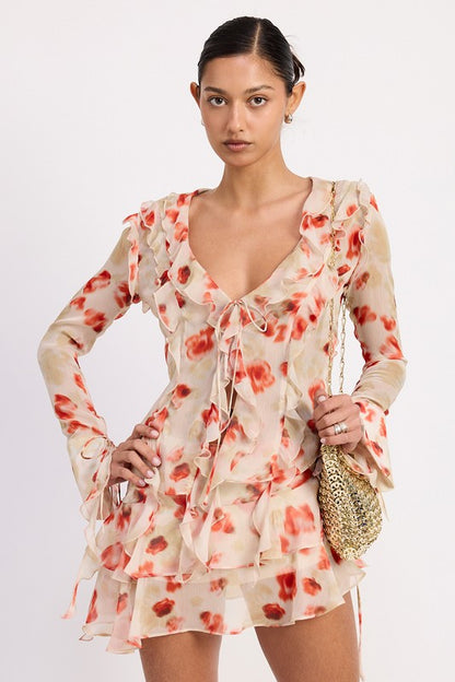 Sheer tomato floral print on a lightweight 100% polyester fabric, perfect for layering or breezy summer days. 