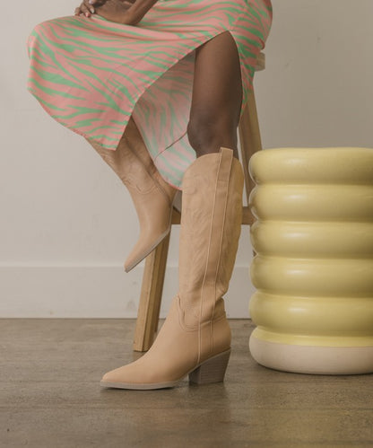 Knee-high western boots with embroidered stitching, pointed toe, stacked block heel, and side zipper closure.