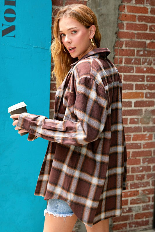Full button-down front closure offers versatility in styling. 