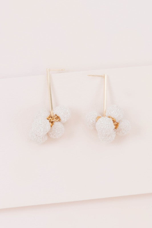 Soft texture. Simple charm. The Simple Life Pom Earrings in Beige are designed for effortless style with a cozy twist. Featuring plush pom-poms in a warm neutral tone, they’re perfect for casual days, cozy outfits, or adding a playful touch to minimalist looks.