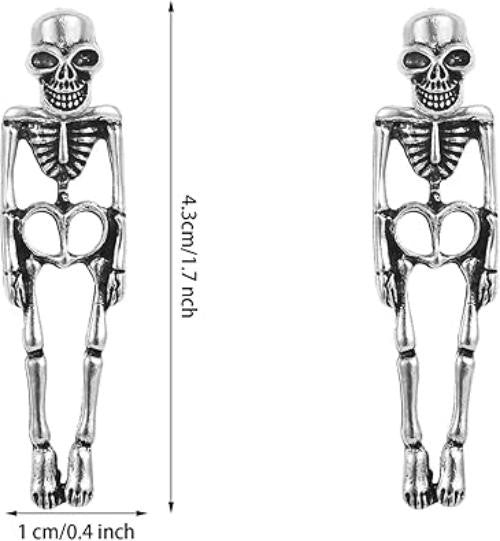 Playful. Edgy. Unforgettable. These Skeleton Stud Dangle Earrings are the perfect fusion of gothic flair and everyday wearability. With detailed skeleton bodies that swing from studded heads, they’re a bold accessory for Halloween, concerts, or just showing off your unique style.