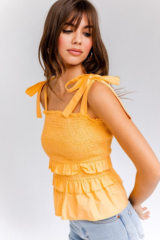 Fully smocked bodice gives a stretchy, flattering fit that hugs the bust.
