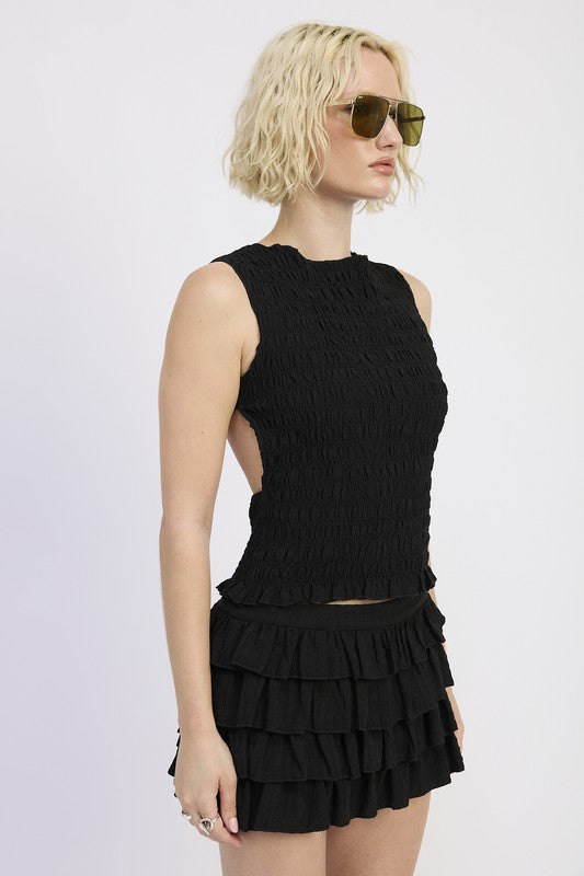 Looks great with denim shorts, maxi skirts, or flowy trousers.