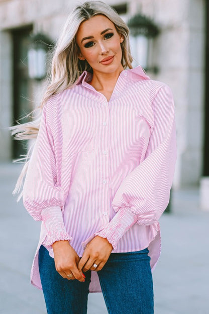 Oversized striped shirt with smocked cuffs and a chest pocket for a relaxed, stylish look.