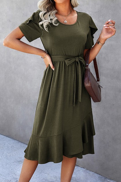 Woman wearing a petal sleeve wrap midi dress with ruffle trim and belted waist