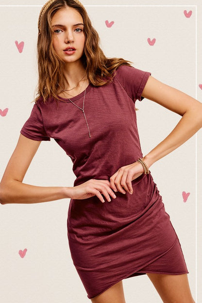 Soft ruched round neck mini dress with short sleeves and side gathering for a flattering silhouette