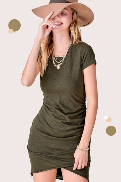 Soft ruched round neck mini dress with short sleeves and side gathering for a flattering silhouette