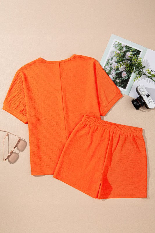 Effortless style. Everyday comfort. This two-piece set combines a textured tee and matching shorts for a laid-back look that’s anything but basic. 