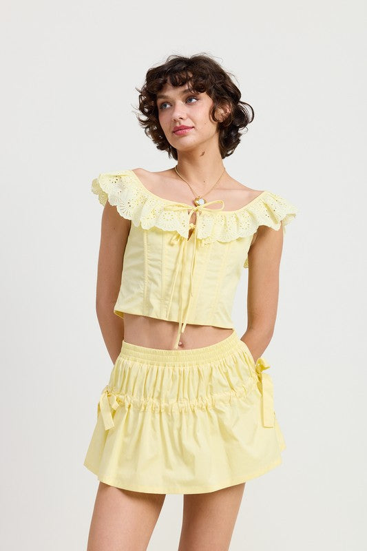 Square neckline with ruffle trim gives a flirty, romantic touch.