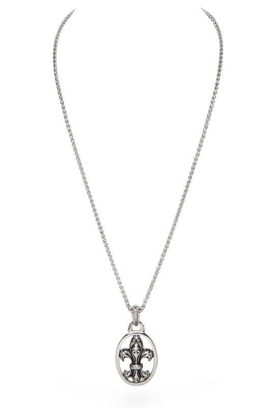 Silver pendant necklace featuring a classic Fleur-de-lis design in an open oval frame. Elegant, timeless, and perfect for everyday wear.