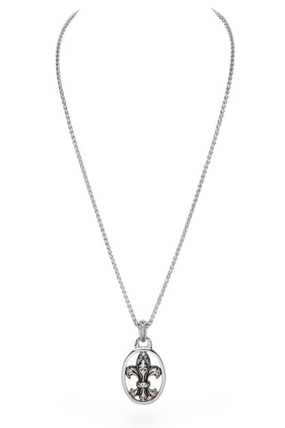 Silver pendant necklace featuring a classic Fleur-de-lis design in an open oval frame. Elegant, timeless, and perfect for everyday wear.