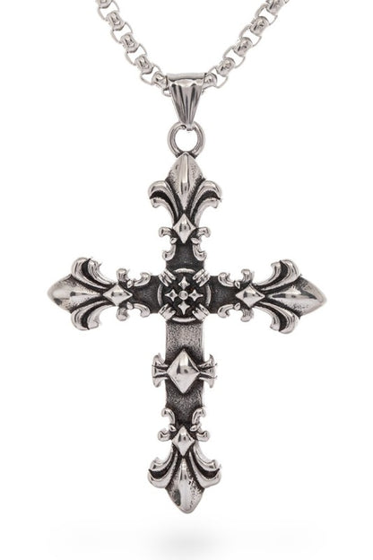 Metallic cross pendant necklace featuring ornate fleur-de-lis accents at each end and intricate central detailing with small cross motifs, vintage, gothic-inspired, and rich in symbolic craftsmanship.