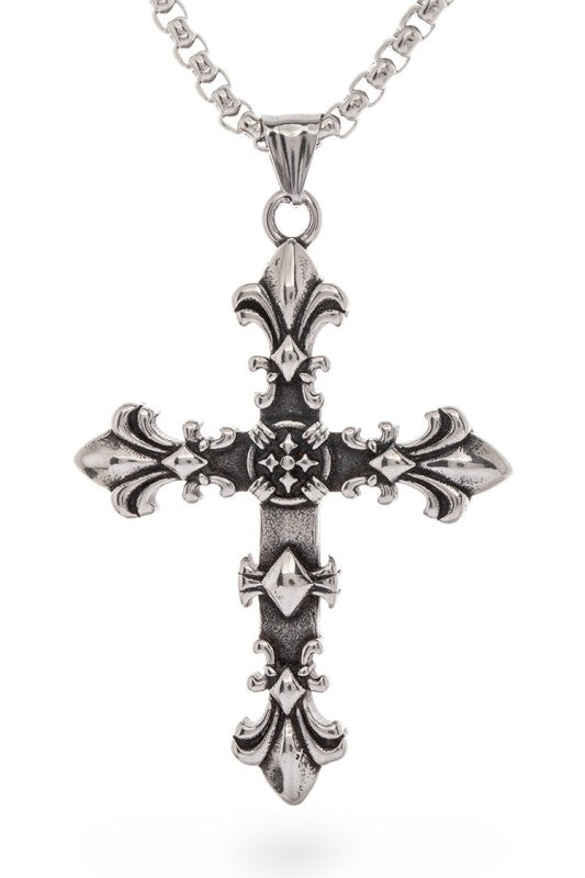Metallic cross pendant necklace featuring ornate fleur-de-lis accents at each end and intricate central detailing with small cross motifs, vintage, gothic-inspired, and rich in symbolic craftsmanship.