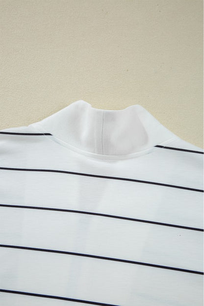 Drop sleeves create a relaxed, casual fit.