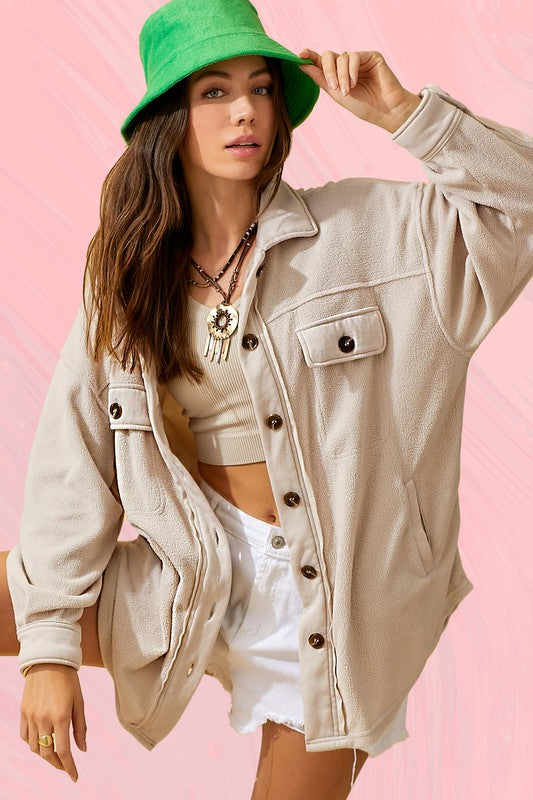 Soft plush texture makes it feel like a throw-on-and-go comfort piece. 