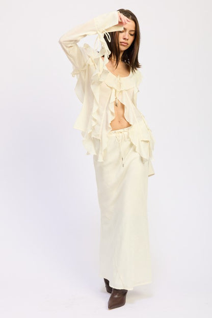 Subtle flutter from ruffles adds movement.