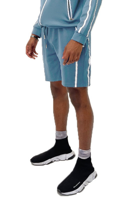 Elevate your everyday look with Taped Stripe Shorts—where comfort meets bold design. Featuring contrast side stripes that add a pop of energy, these shorts are perfect for workouts, hangouts, or laid-back weekends. Whether you're hitting the gym or the streets, they deliver effortless style and movement.