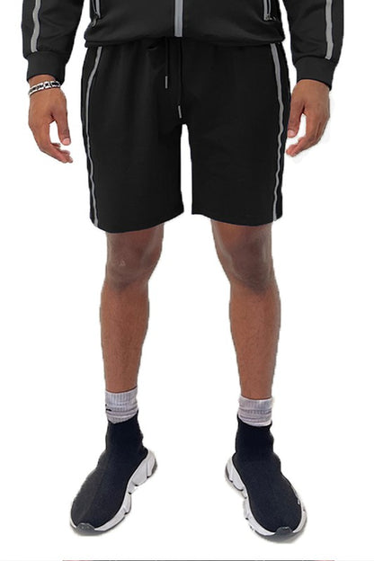 Elevate your everyday look with Taped Stripe Shorts—where comfort meets bold design. Featuring contrast side stripes that add a pop of energy, these shorts are perfect for workouts, hangouts, or laid-back weekends. Whether you're hitting the gym or the streets, they deliver effortless style and movement.