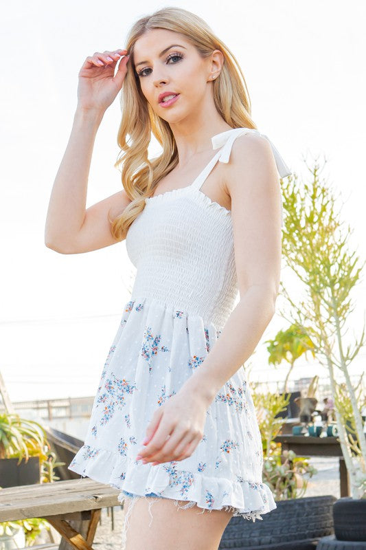 A go-to summer top: smocked, easy to wear, with cute tie-shoulder accents.