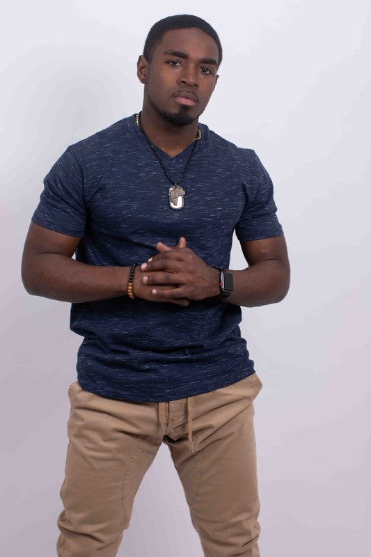 The tri-blend V-neck T-shirt combines soft, durable fabric with a flattering drape and a comfortable, subtle heathered look.