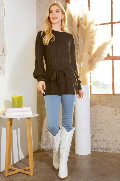 Easy layering piece with waist tie detail for a feminine, modern look.