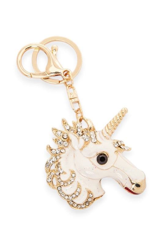 Unicorn head keychain with white enamel base, gold accents, and sparkling rhinestones along the mane and horn, whimsical, elegant, and perfect for fans of magical accessories.