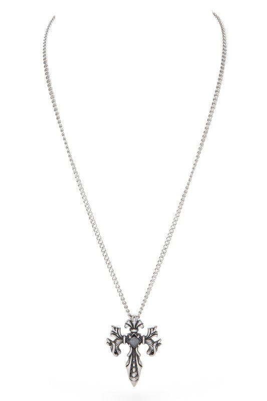 Silver gothic-style cross pendant necklace featuring ornate flourishes and a striking dark gemstone with a glowing orange center, bold, detailed, and perfect for statement wear.