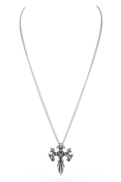 Silver gothic-style cross pendant necklace featuring ornate flourishes and a striking dark gemstone with a glowing orange center, bold, detailed, and perfect for statement wear.