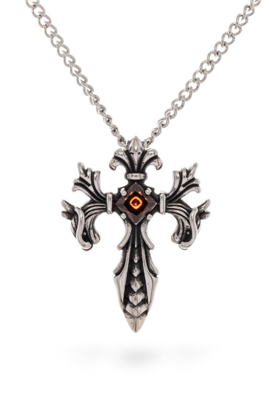 Silver gothic-style cross pendant necklace featuring ornate flourishes and a striking dark gemstone with a glowing orange center, bold, detailed, and perfect for statement wear.
