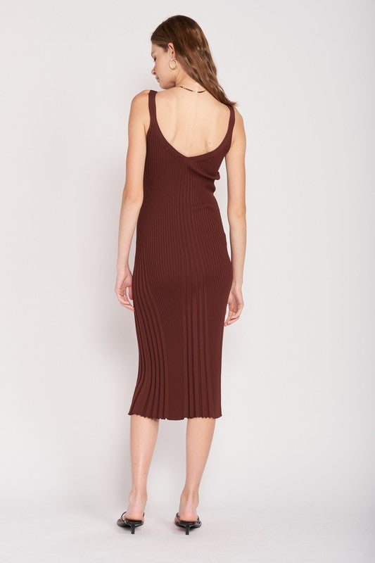 back view of woman wearing a brown ribbed dress