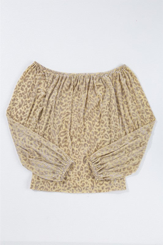 The burnout fabric creates a semi-sheer effect, adding depth and dimension to the print.