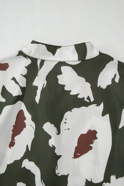 Ruffle accents around the neckline and hem boost femininity. 