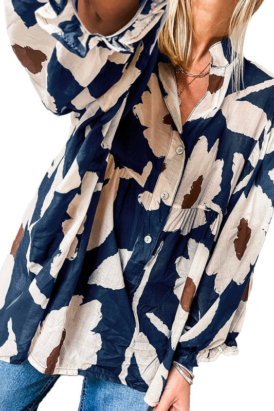 The frill neck design hides the collar for a vintage 60s silhouette. 