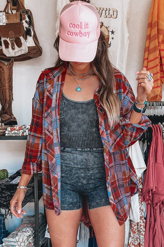Loose fit plaid shirt in vibrant orange for retro flair.