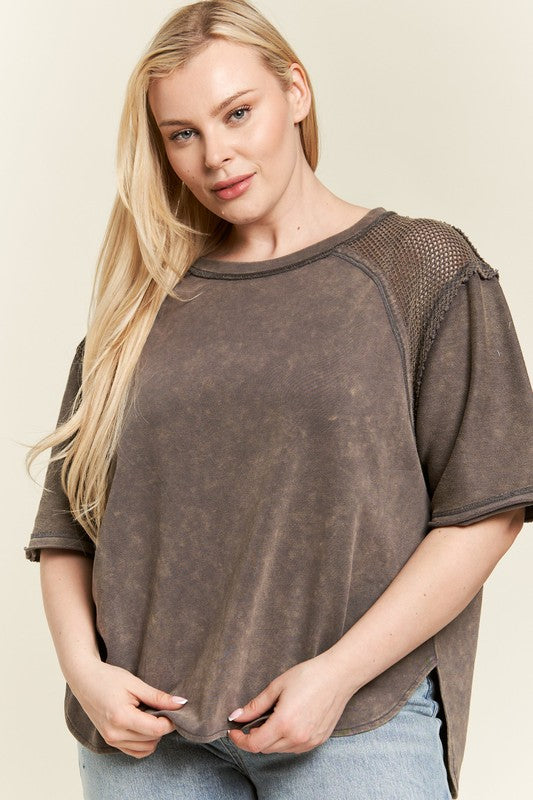 Washed cotton-poly blend (82% cotton, 18% polyester) for softness and relaxed wear. 