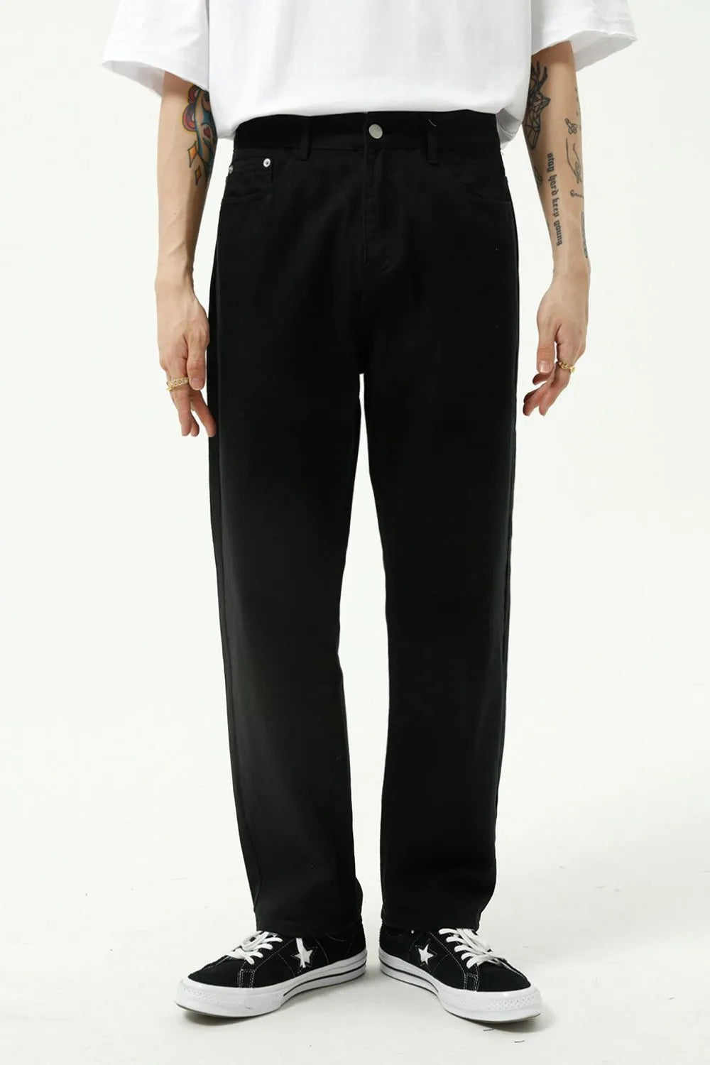 Classic silhouette. Modern edge. These jeans combine the timeless appeal of a straight leg with the sleekness of a slim fit—finished in a washed tone that adds character to every step.