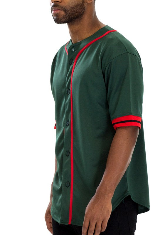 Man wearing a baseball-style shirt with red piping, black buttons, and red-striped short sleeves.