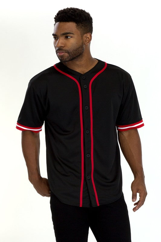 Man wearing a baseball-style shirt with red piping, black buttons, and red-striped short sleeves.